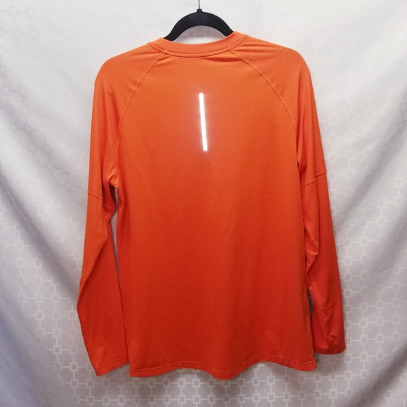 orange dri fit long sleeve shirt